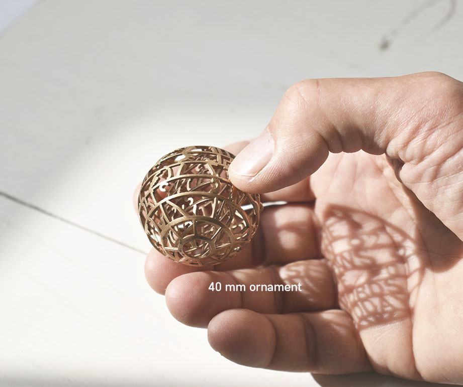 sunrose-sundial-ornament-in-hand